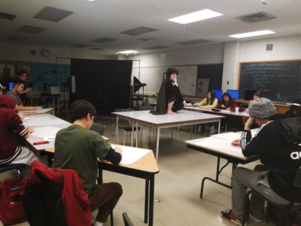 students drawing a hobbit