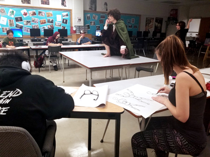students drawing a hobbit