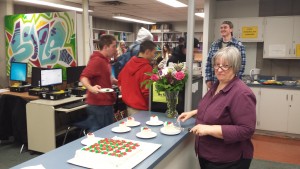 handing out cake