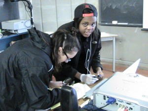 students examining evidence