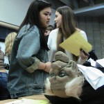 students examining body