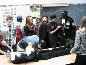 students with body in foreground