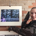 c posing with her photo