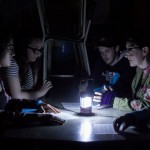 students in lantern light