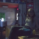 sitting on the stage