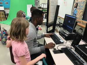 miles showing the kids how to green screen